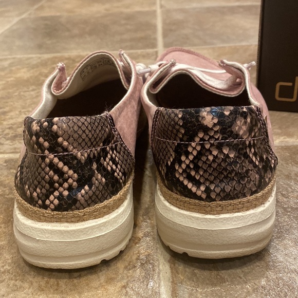 Hey dudes. Pink w/ snake print. Slightly worn. - Picture 2 of 5